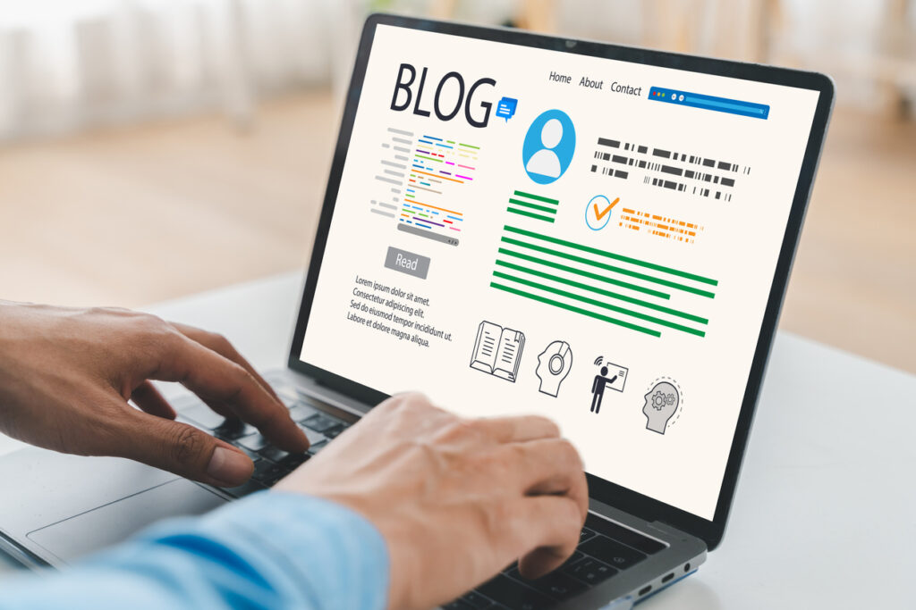 Business owner writing an SEO blog while reviewing keyword research and website analytics.