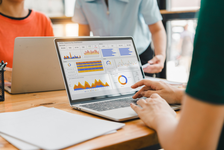Laptop displaying website analytics and SEO data illustrating how Google ranks websites.