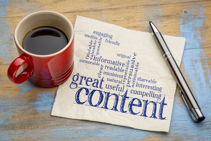 Content strategy concept with coffee, pen, and typography illustrating SEO content strategy and blog planning.