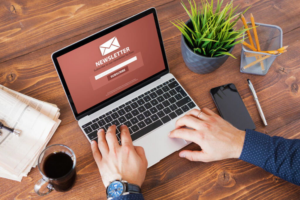 Marketer transforming one blog post into email newsletters, social media content, and other marketing assets.
